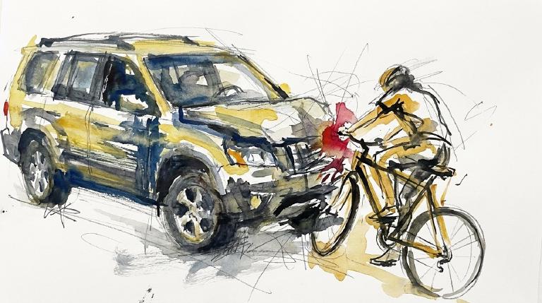 Early morning on 2nd Avenue, a cyclist goes down